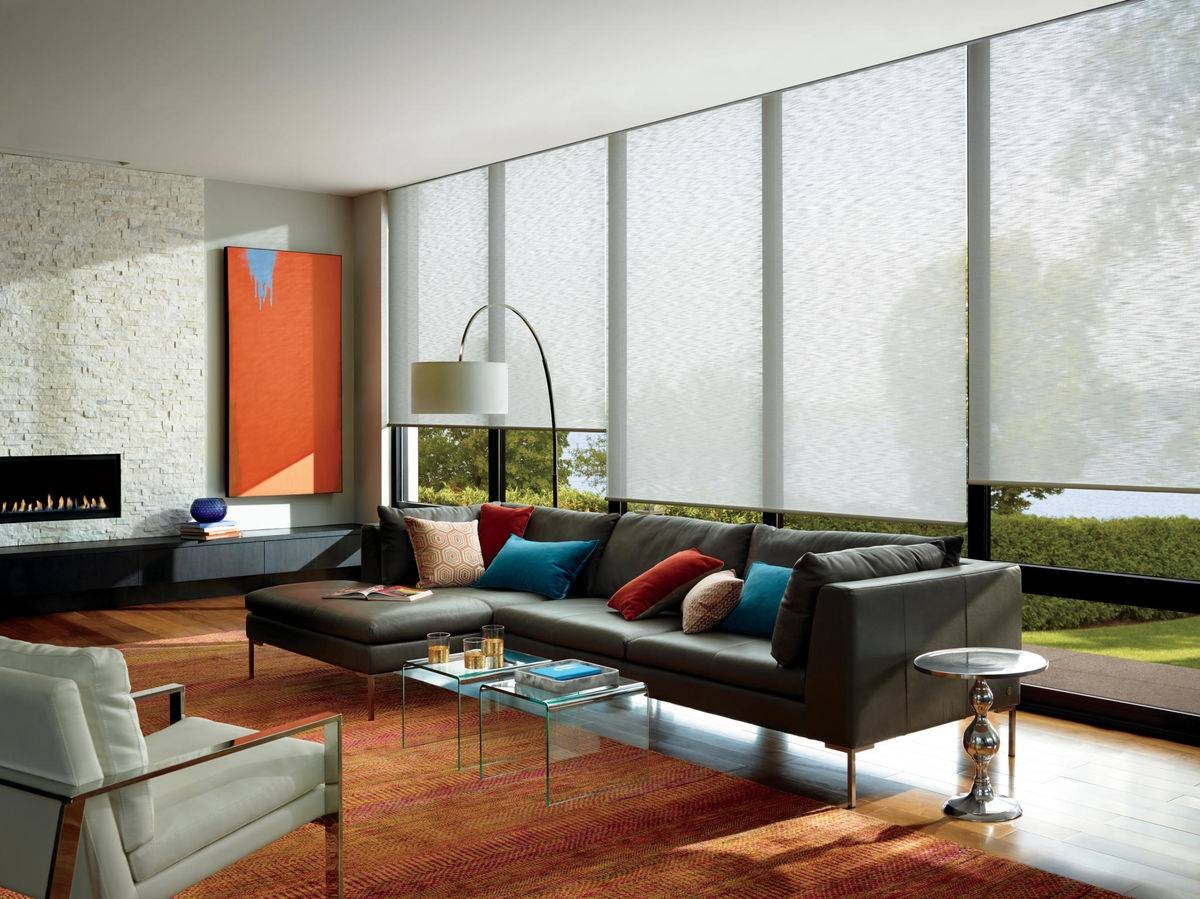 Hunter Douglas Designer Roller Shades blocking light in a living room near Industry, CA