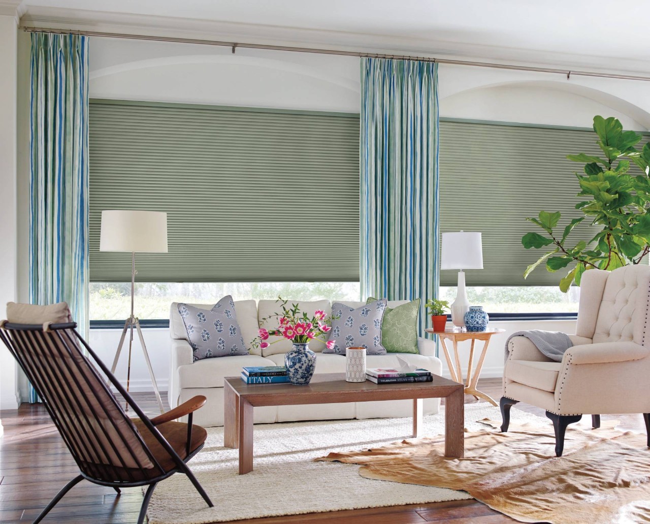 Hunter Douglas Carole Fabrics™ Custom Drapes accenting green window shades near City of Industry, CA