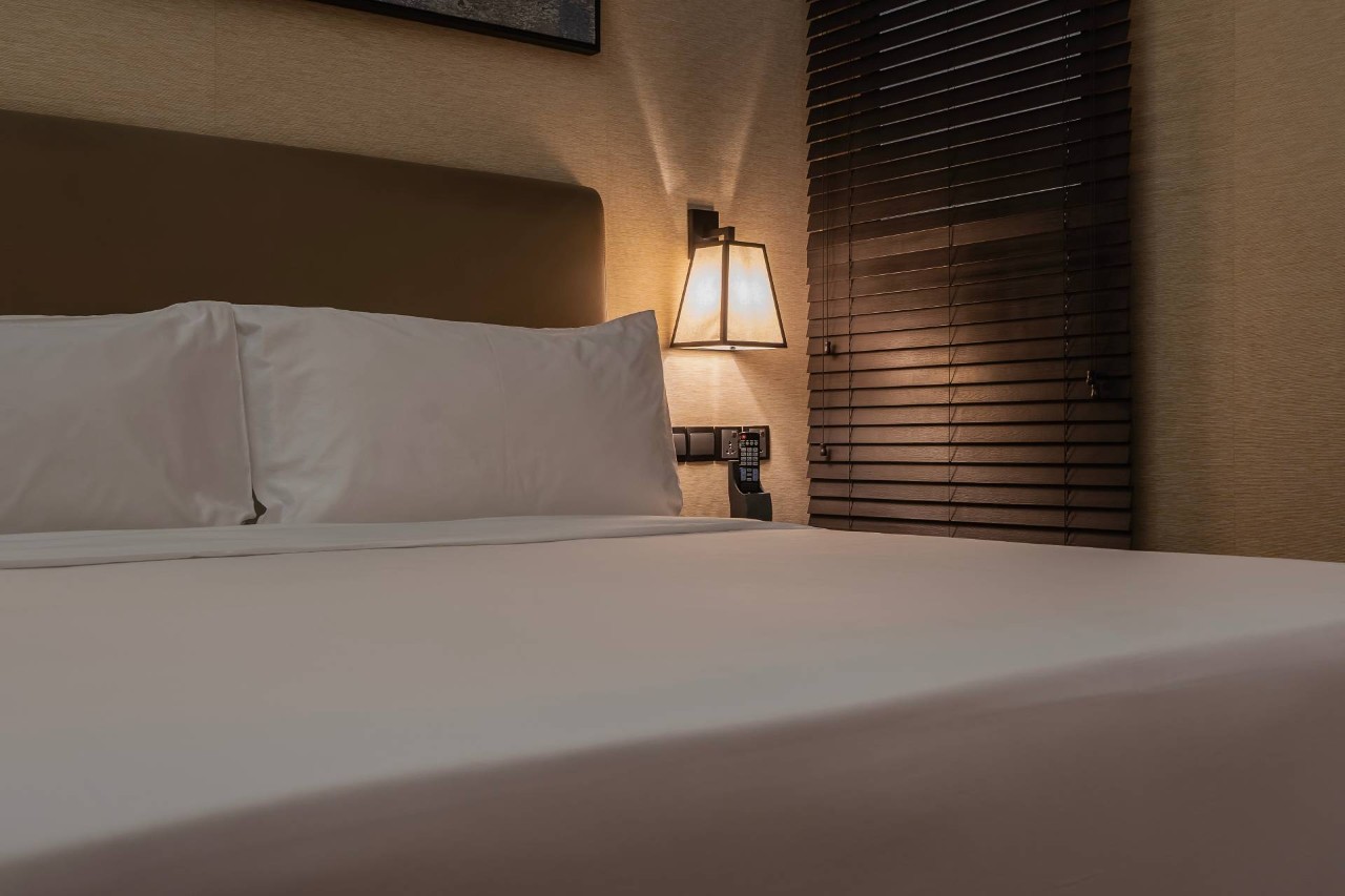 Wood bedroom blinds in a home near City of Industry, CA